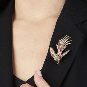 PETOCHI SPILLA A FORMA DI UCCELLO DEL PARADISO  - Asta Gioielli - Associazione Nazionale - Case d'Asta italiane