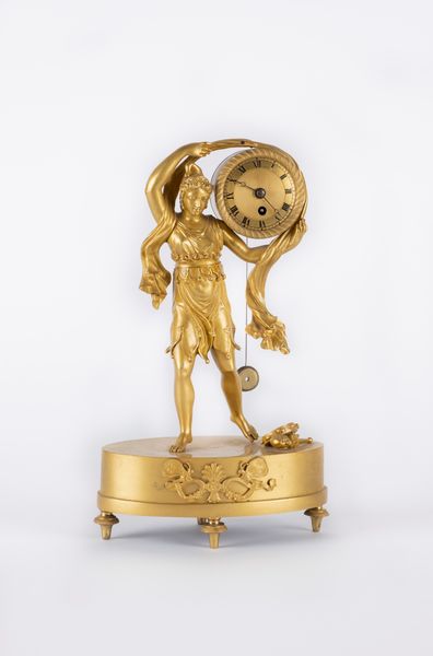 Orologio da appoggio francese in bronzo dorato al mercurio. Epoca Impero.  - Asta Arredi Antichi - Associazione Nazionale - Case d'Asta italiane