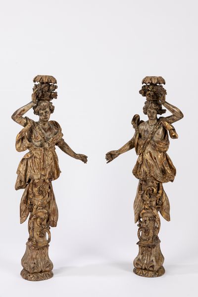 Coppia di cariatidi in legno intagliato, dorato e laccato. Venezia secolo XVII  - Asta Arredi Antichi - Associazione Nazionale - Case d'Asta italiane