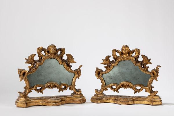 Coppia di cartaglorie in legno dorato e intagliato, montate a specchio  - Asta Arredi Antichi - Associazione Nazionale - Case d'Asta italiane