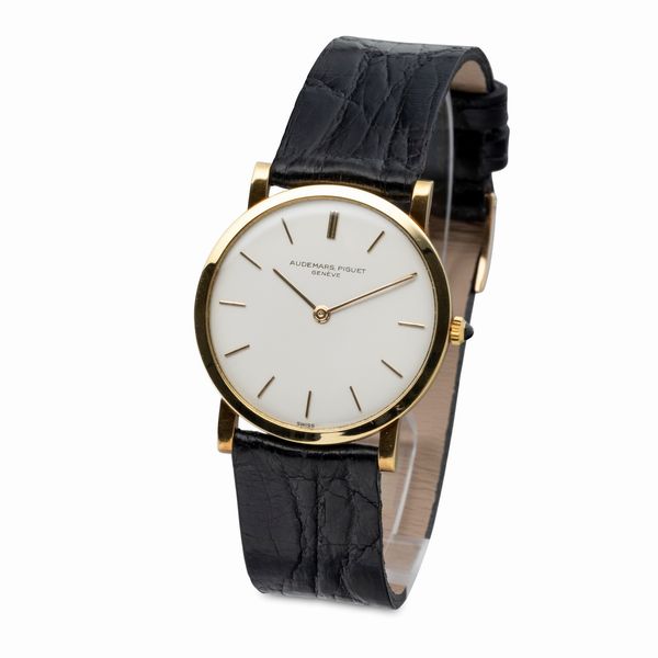 AUDEMARS PIGUET : Elegante Ultrapiatto in oro giallo, quadrante Argent con indici applicati e zaffiro cabochon sulla corona, carica manuale  - Asta Orologi da Polso e da Tasca - Associazione Nazionale - Case d'Asta italiane