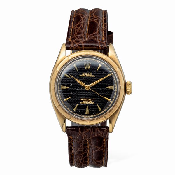 ROLEX : Elegante Oyster Perpetual ref 6085 in oro giallo 18k, quadrante nero Guilloch con indici triangolari e a bastone, fondello a vite movimento automatico  - Asta Orologi da Polso e da Tasca - Associazione Nazionale - Case d'Asta italiane