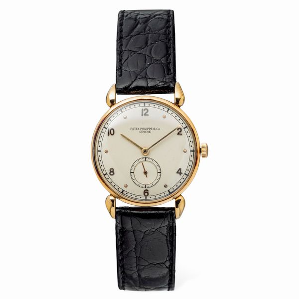 PATEK PHILIPPE : Elegante Calatrava Tear Drop ref 590, anse a goccia in oro giallo 18k, secondi al sei, numeri pari Arabi applicati  - Asta Orologi da Polso e da Tasca - Associazione Nazionale - Case d'Asta italiane