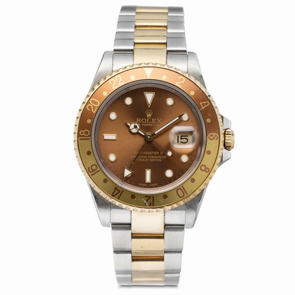 ROLEX : Intrigante GMT Master II ref 16713 Occhio di Tigre in acciaio e oro con ghiera girevole bicolore, doppio fuso orario, quadrante Brown e bracciale Oyster  - Asta Orologi da Polso e da Tasca - Associazione Nazionale - Case d'Asta italiane