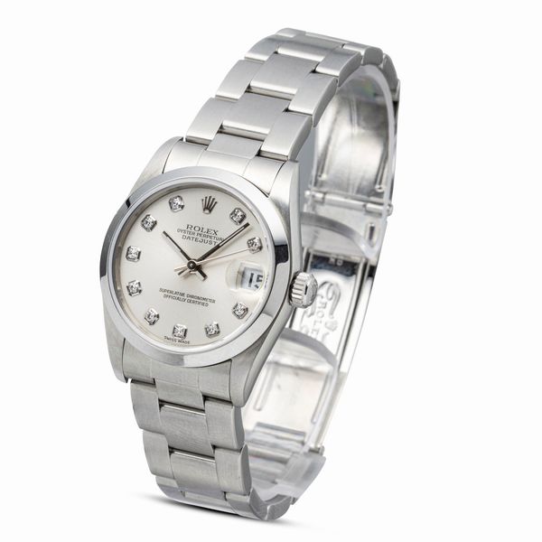 ROLEX : Fine ed elegante Datejust in acciaio con ghiera liscia, quadrante Argent con indici delle ore in brillanti, misura media, accompagnato da scatola e garanzia  - Asta Orologi da Polso e da Tasca - Associazione Nazionale - Case d'Asta italiane