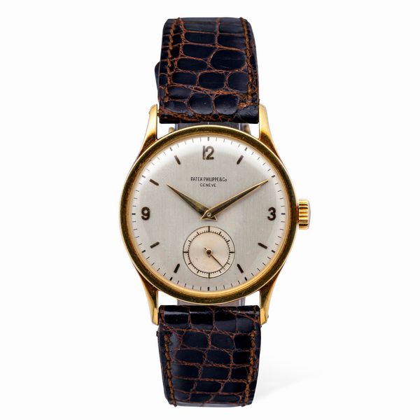 PATEK PHILIPPE : Elegante Calatrava ref 570 J in oro giallo 18k quadrante Argent con numeri Arabi applicati e secondi al sei, accompagnato da estratto d'archivio  - Asta Orologi da Polso e da Tasca - Associazione Nazionale - Case d'Asta italiane
