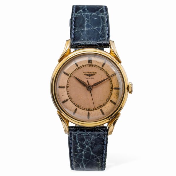 LONGINES : Elegante e raro orologio in oro Rosa 18k con anse Fancy elicoidali, quadrante Salmone bitonale, realizzato per il mercato francese, sfere Gladio e secondi centrali  - Asta Orologi da Polso e da Tasca - Associazione Nazionale - Case d'Asta italiane