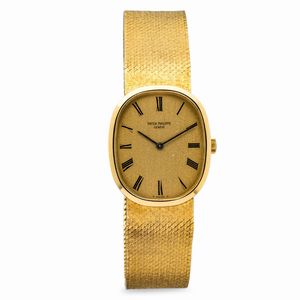 PATEK PHILIPPE - Classico Ellipse ref 3548 in oro giallo 18k con bracciale integrato, quadrante champagne con numeri Romani laccati neri