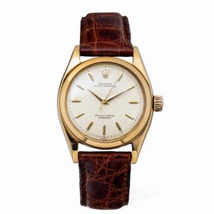 ROLEX - Classico Ovettone ref 6285 in oro giallo 18k, quadrante argentato gren, secondi centrali e sfere Dauphine, fondello a vite e carica automatica