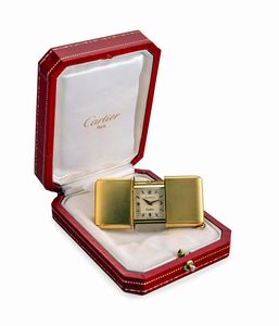 CARTIER - Raro e prezioso Ermeto firmato Cartier in oro giallo 18k con lavorazione in rilievo su cuvette esterna con scatola originale di presentazione. Firma di Cartier NY nascosta incisa accanto ai numeri seriali