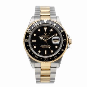 ROLEX - Sportivo GMT Master II ref 16713 acciaio e oro quadrante nero, doppia fuso orario, bracciale Oyster