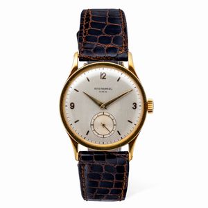 PATEK PHILIPPE - Elegante Calatrava ref 570 J in oro giallo 18k quadrante Argent con numeri Arabi applicati e secondi al sei, accompagnato da estratto d'archivio