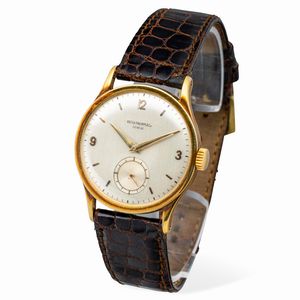 PATEK PHILIPPE : Elegante Calatrava ref 570 J in oro giallo 18k quadrante Argent con numeri Arabi applicati e secondi al sei, accompagnato da estratto d'archivio  - Asta Orologi da Polso e da Tasca - Associazione Nazionale - Case d'Asta italiane