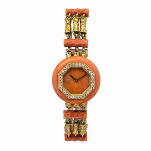 BOUCHERON - Raffinato e particolare Boucheron da sera in oro giallo, brillanti e pietra dura alternati esilmente nel bracciale Bamboo, carica manuale nascosta