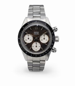 ROLEX - Iconico e ricercato Cosmograph Daytona ref 6263 in acciaio, quadrante nero virato Tropical ghiera in bachelite nera e tasti a vite