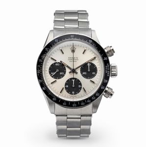 ROLEX - Raro e ricercato Cosmograph Daytona ref 6240 in acciaio con ghiera in bachelite e tasti a vite Millerighe, quadrante argentato Gren e contatori neri a contrasto