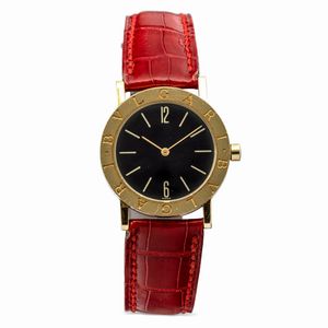 bulgari - Fine ed elegante, Bulgari, orologio da polso Lady in oro giallo, quadrante nero e movimento al quarzo