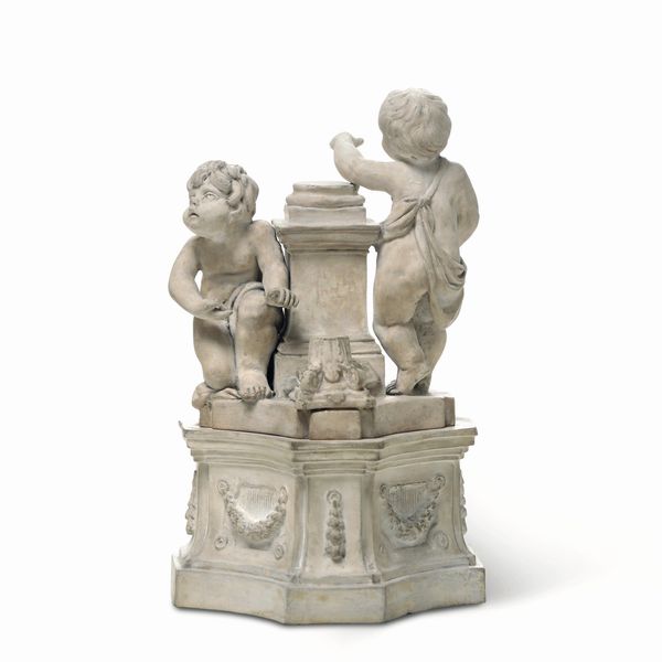 Gruppo su piedistallo<BR>Torino, Manifattura di Vinovo, periodo Lomello, 1815-1825<BR>  - Asta Maioliche e Porcellane - Associazione Nazionale - Case d'Asta italiane