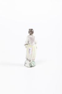 Figurina di venditrice<BR>Torino, Manifattura di Vinovo, probabilmente periodo Hannong, 1776-1779<BR>  - Asta Maioliche e Porcellane - Associazione Nazionale - Case d'Asta italiane