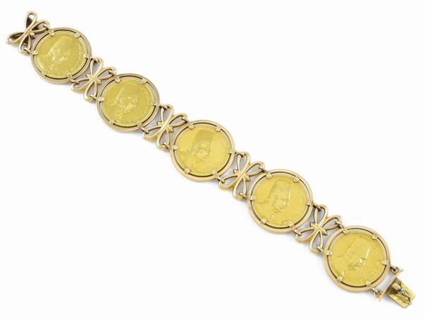 Bracciale in oro giallo con cinque monete da 100 piastre egiziane  - Asta Gioielli e Orologi - Associazione Nazionale - Case d'Asta italiane