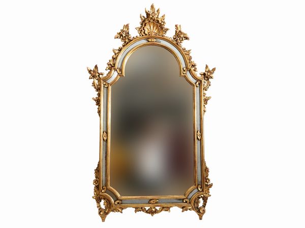 Specchiera in legno intagliato e dorato  - Asta Una casa al Ponte Vecchio - Associazione Nazionale - Case d'Asta italiane