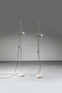 TITO AGNOLI - Coppia di lampade da terra regolabili in altezza  base in travertino. Prod. Oluce  met� anni '50 h cm 191 5x17  [..]