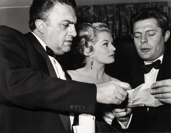 Alberto Durazzo : lotto formato da due scatti fotografici<BR> Senza titolo (Federico Fellini, Anita Ekberg, Marcello Mastroianni)  - Asta Fotografia - Associazione Nazionale - Case d'Asta italiane