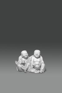 SCULTURA - Gruppo in porcellana blanc de chine rappresentante due monaci seduti  Cina  dinastia Qing  XIX sec H cm 11x16