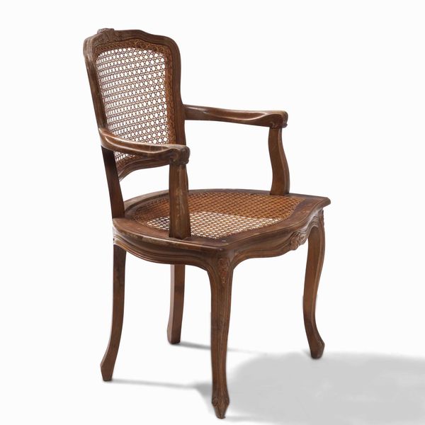 Poltrona in noce con seduta e schienale in cannet�  - Asta Antiquariato Luglio - Associazione Nazionale - Case d'Asta italiane