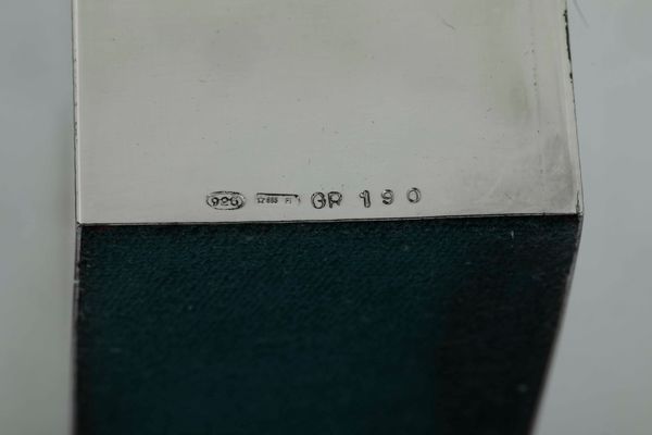 Insieme composto da accendino, portabiglietti e scatola. Differenti manifatture fiorentine del XX-XXI secolo  - Asta Argenti - Associazione Nazionale - Case d'Asta italiane