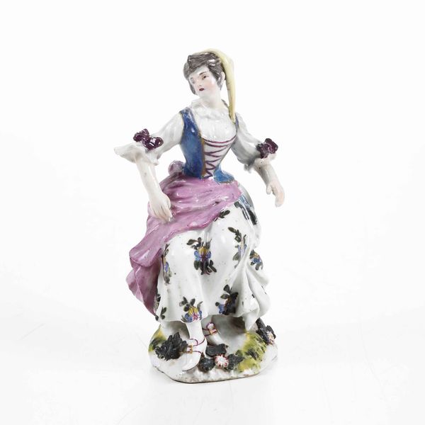 Figurina<BR>Meissen, 1750 circa (porcellana).<BR>Decorazione probabilmente XIX secolo.<BR><BR>  - Asta Ceramiche - Associazione Nazionale - Case d'Asta italiane