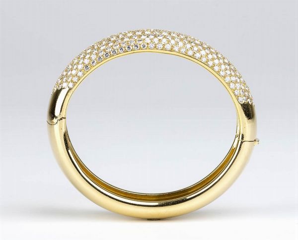 DAMIANI: bracciale a cerchio rigido in oro e diamanti  - Asta Gioielli, orologi, argenti e penne - Associazione Nazionale - Case d'Asta italiane