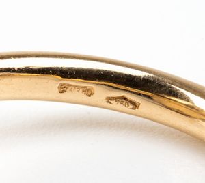 POMELLATO: anello chimera in oro con granato e diamanti brown  - Asta Gioielli, orologi, argenti e penne - Associazione Nazionale - Case d'Asta italiane