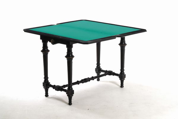 Tavolo da gioco in legno intagliato ed ebanizzato. XIX-XX secolo  - Asta Antiquariato Settembre - Associazione Nazionale - Case d'Asta italiane