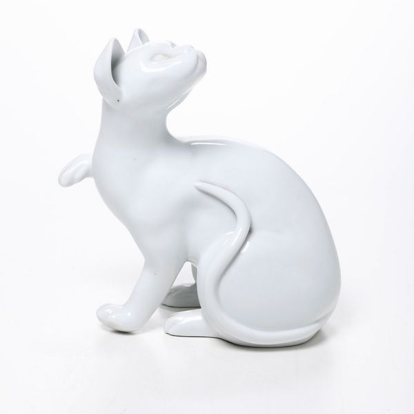 Scultura di gatto.<BR>Francia, Limoges, Manifattura Coquet, seconda metà del XX secolo.  - Asta Maioliche e Porcellane - Associazione Nazionale - Case d'Asta italiane