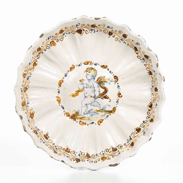 Coppa in stile compendiario.<BR>Italia centrale, XIX secolo (?).  - Asta Maioliche e Porcellane - Associazione Nazionale - Case d'Asta italiane