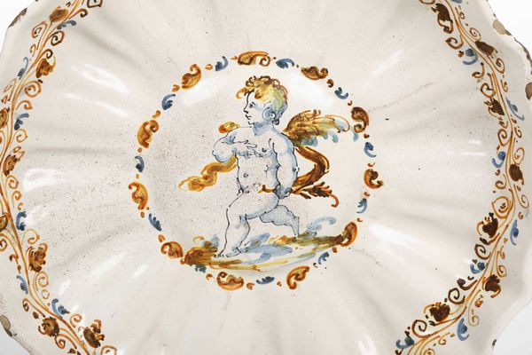 Coppa in stile compendiario.<BR>Italia centrale, XIX secolo (?).  - Asta Maioliche e Porcellane - Associazione Nazionale - Case d'Asta italiane