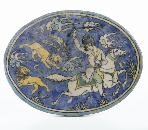 Targa raffigurante la caccia al leone. <BR>Persia, XIX secolo.  - Asta Maioliche e Porcellane - Associazione Nazionale - Case d'Asta italiane