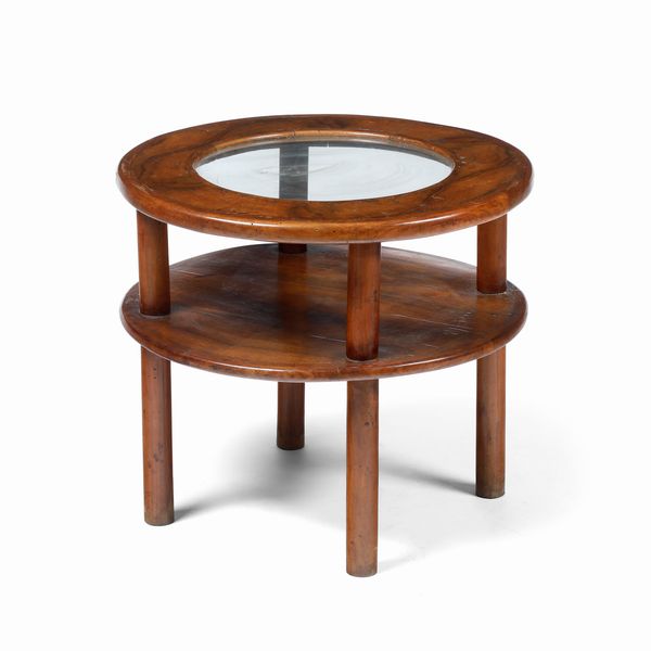 Tavolino tondo in legno con piano in vetro. XX secolo  - Asta Antiquariato e dipinti - Associazione Nazionale - Case d'Asta italiane