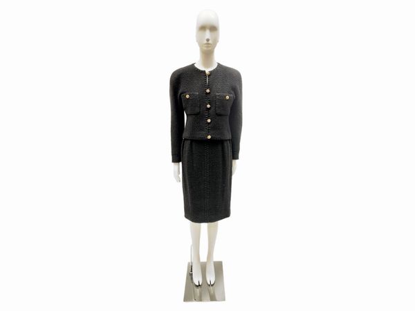 Chanel, Tailleur in tessuto di lana nera boucl�  - Asta Vintagemania - Associazione Nazionale - Case d'Asta italiane