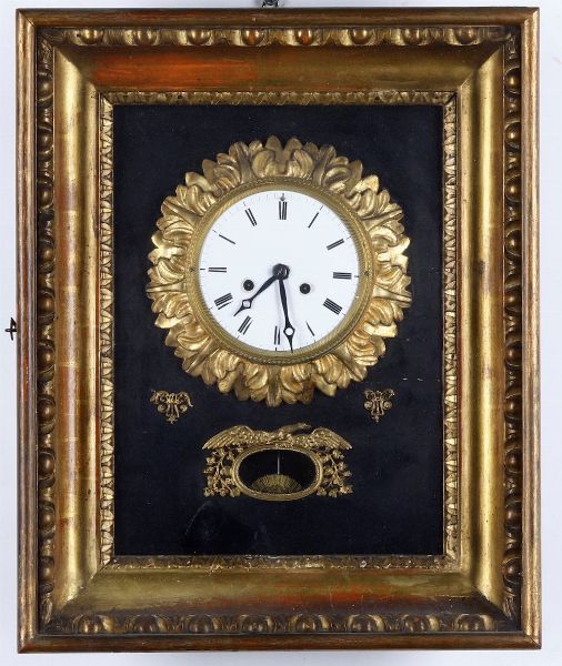 Orologio da parete in legno intagliato e dorato. Austria, XIX secolo  - Asta Pendole e orologi - Associazione Nazionale - Case d'Asta italiane