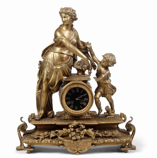 Orologio in bronzo dorato sormontato da scena allegorica. Francia, XIX secolo  - Asta Pendole e orologi - Associazione Nazionale - Case d'Asta italiane