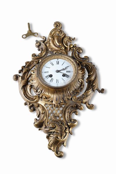 Orologio tipo Cartel in bronzo dorato. XIX-XX Secolo  - Asta Pendole e orologi - Associazione Nazionale - Case d'Asta italiane