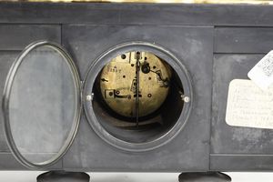 Orologio da appoggio in bronzo e legno ebanizzato. XIX secolo  - Asta Pendole e orologi - Associazione Nazionale - Case d'Asta italiane