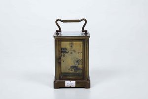 Pendoletta da carrozza in ottone. Seconda met XIX secolo  - Asta Pendole e orologi - Associazione Nazionale - Case d'Asta italiane