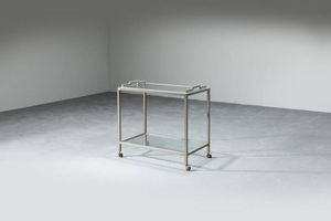 ANTONIO PAVIA - Carrellino con struttura in metallo e piani in vetro.  Anni '70 cm 65x70x40  Sbeccatura del vetro e difetti