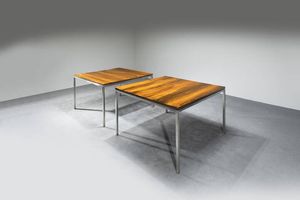 PRODUZIONE ITALIANA - Coppia di tavoli con struttura in acciaio e piano in legno.  Provenienti dal Ristorante Trussardi alla Scala di  [..]
