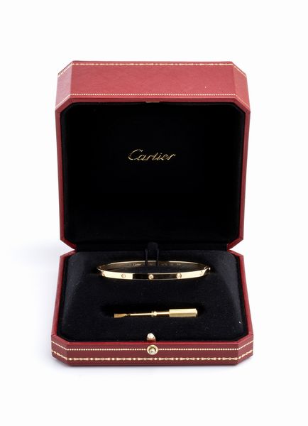 CARTIER, collezione Love: bracciale rigido in oro e diamanti  - Asta Gioielli, orologi, argenti e penne - Associazione Nazionale - Case d'Asta italiane