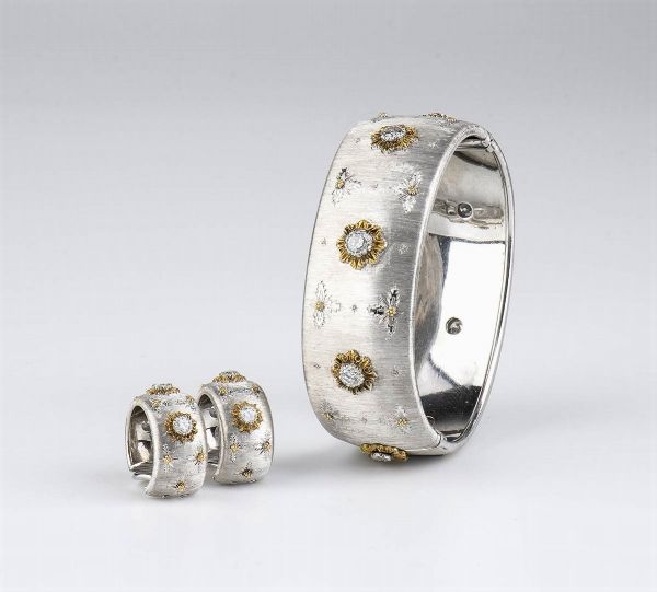 MARIO BUCCELLATI: bracciale a fascia rigida e paio di orecchini in oro e diamanti  - Asta Gioielli, orologi, argenti e penne - Associazione Nazionale - Case d'Asta italiane