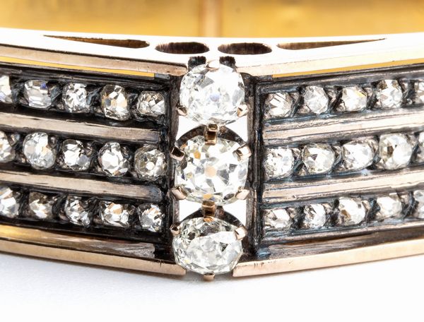 Bracciale a cerchio rigido in oro e diamanti  - Asta Gioielli, orologi, argenti e penne - Associazione Nazionale - Case d'Asta italiane